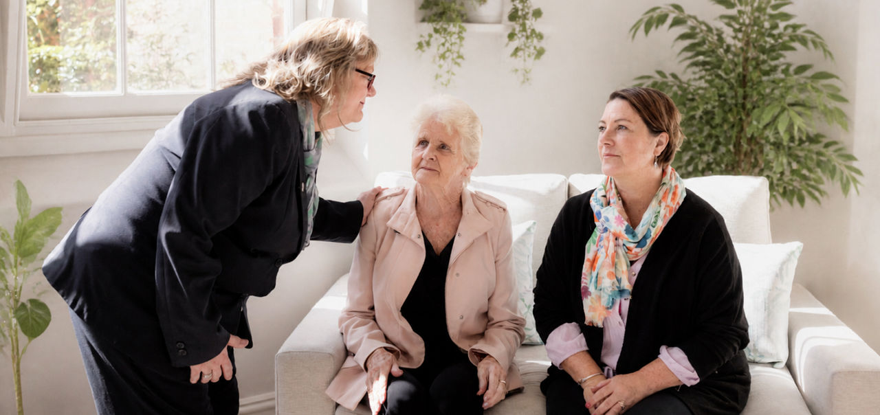 funeral arranger with family