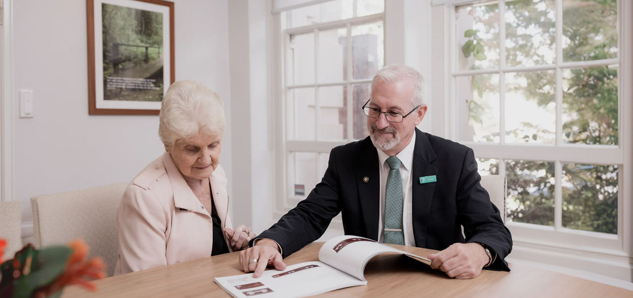funeral arranger with woman