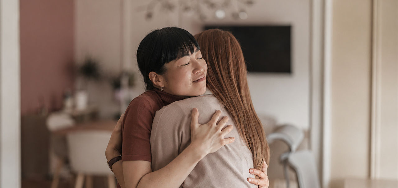 two women hugging
