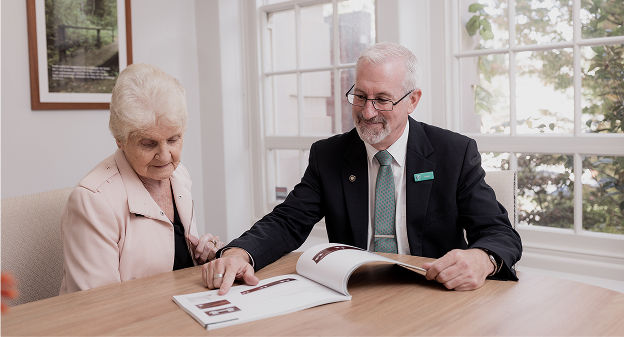 funeral arranger with woman